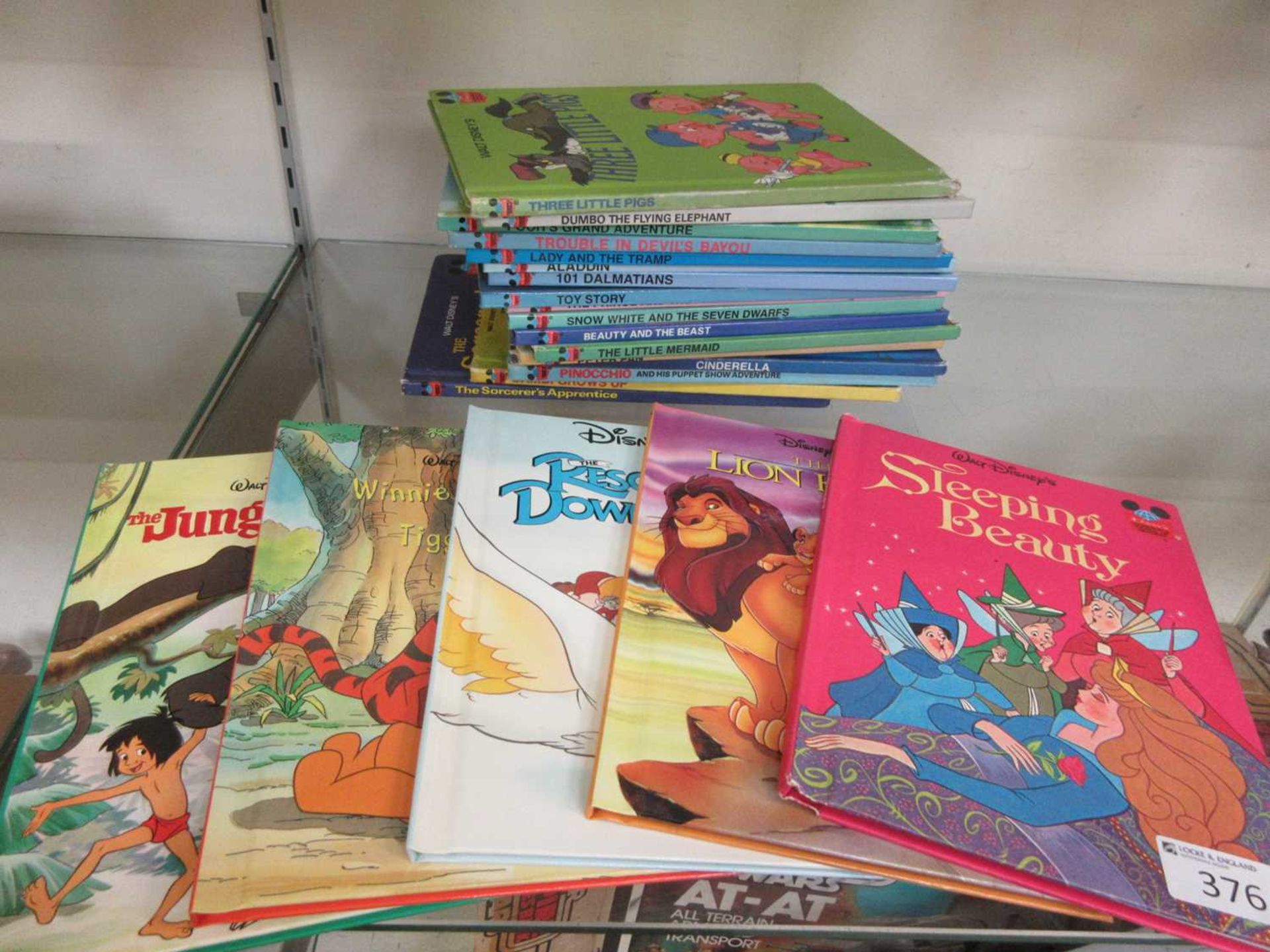 A quantity of Walt Disney children's books to include Sleeping Beauty, The Jungle Book, etc