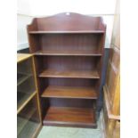 A mid-20th century wooden bookcase