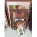 Two unframed artworks together with a selection of framed artworks