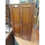 A late Victorian mahogany two door cupboard.