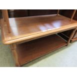 A waxed pine rectangular occasional table with under tier