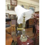 A pierced brass table lamp.