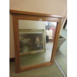 An oak framed mirror