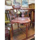 An eastern hardwood inlaid corner chair.