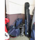 A large quantity of fishing equipment to include rods, bags, trolley, etc