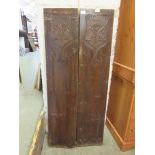 A pair of Art Nouveau carved walnut panels