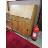 A mid-20th century fall front bureau