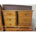 A pair of modern pine bedside chests