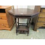 An early 20th century walnut octagonal occasional table