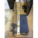 Two carpenter's sash cramps together with a Stanley spirit level and a Halfords spanner set