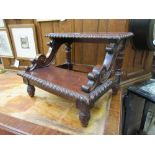 A set of reproduction mahogany steps with scrolling supports on turned and carved legs