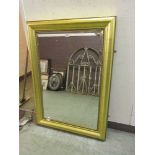 A gilt framed bevel glass rectangular mirror