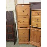 A pair of modern pine filing cabinets