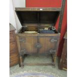 An early 20th century Fullotone gramophone player in oak case with a selection of 78 rpm records