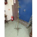 An early 20th century brass oil lamp stand
