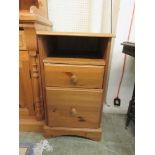 A modern pine unit with open storage, filing drawer and drawer