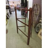 An early 20th century mahogany clothes horse