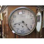 A reproduction Sterling and Noble wall clock