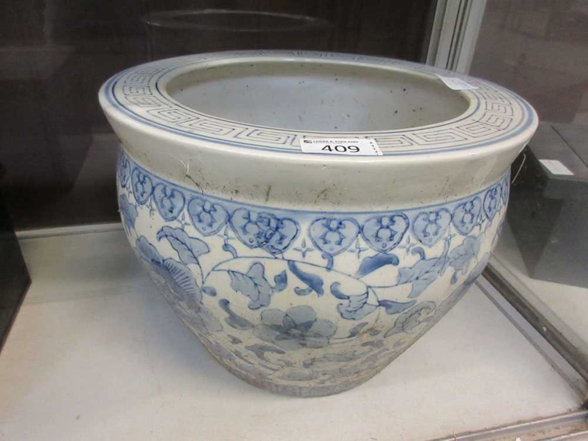 A reproduction blue glazed oriental fish bowl
