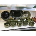 A selection of green glazed tableware by Portmeirion and others to include side plates, coffee cups,