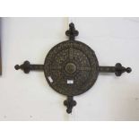 A cast metal medieval style wall hanging coat rack