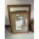 Three framed and glazed artworks to include a watercolour of countryside, town scene etc.