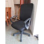 A black office chair on five-star base