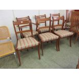 A set of six reproduction dining chairs