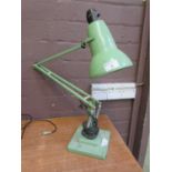 A Herbert Terry green angle poise lamp with two step base