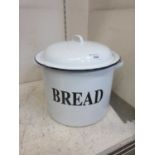 A white enamelled bread bin