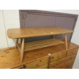 An Ercol coffee table with under tier