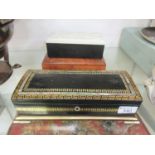 A black and gilt lacquered box with mother of pearl inlay along with PVC box with embossed white lid