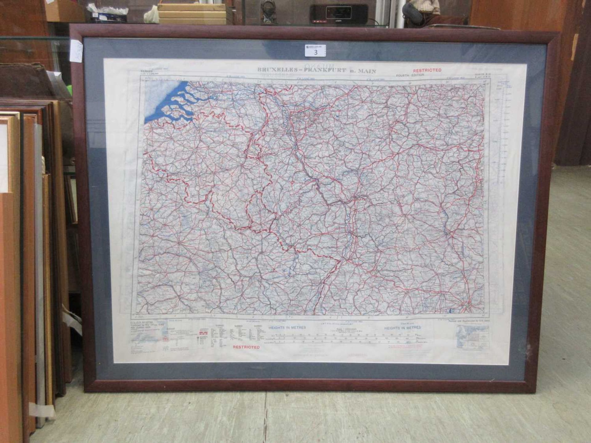 A framed and glazed map of Brussels to Frankfurt issued by the War Office 1942 (fourth edition