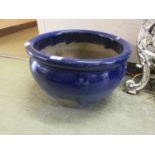A blue glazed garden pot