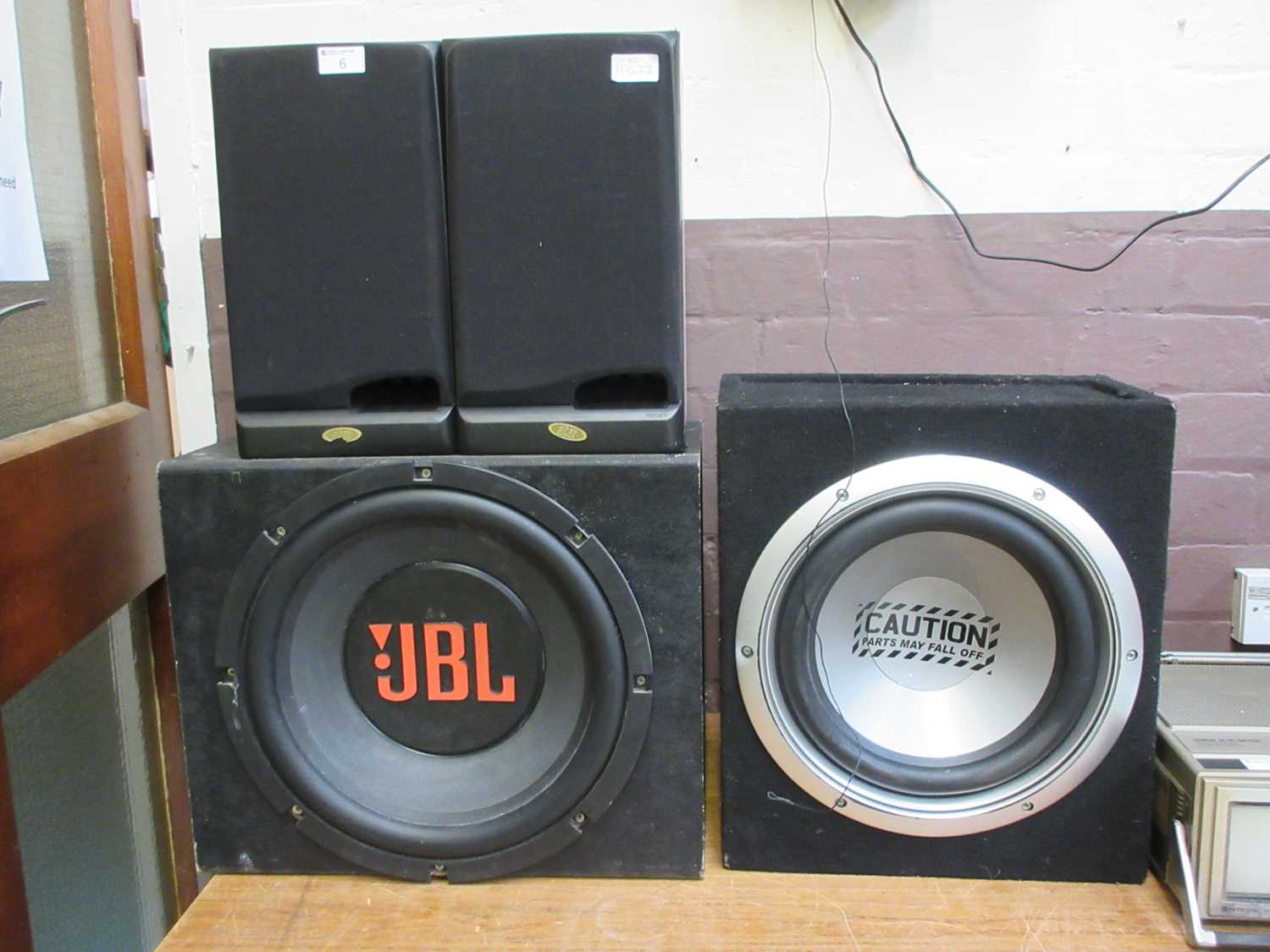 Four speakers to include a pair of Eltax speakers, a JBL speaker, etc