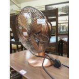 A copper effect desktop fan