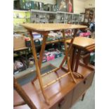 An Edwardian style satin birch folding occasional table