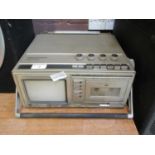 A Hitachi Tri Mode colour TV radio cassette recorder