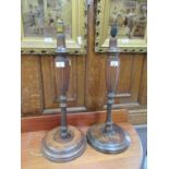 A pair of turned mahogany columned table lamps
