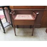 An early 20th century mahogany and boxwood strung music stool