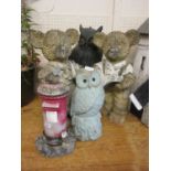 Five plastic moulded garden ornaments in the form of owls, teddy bears, birds, etc