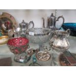 Silver plated items to include coffee and tea pots, bowls, tongs, etc