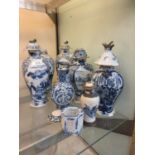 A collection of blue and white oriental ceramics to include moon flask, lidded vases, etc (A/F)