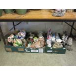 Three trays of garden ornaments to include composite stone, plastic moulded gnomes, owl, etc