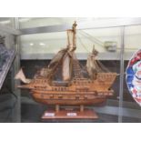 A wooden model of sailing vessel