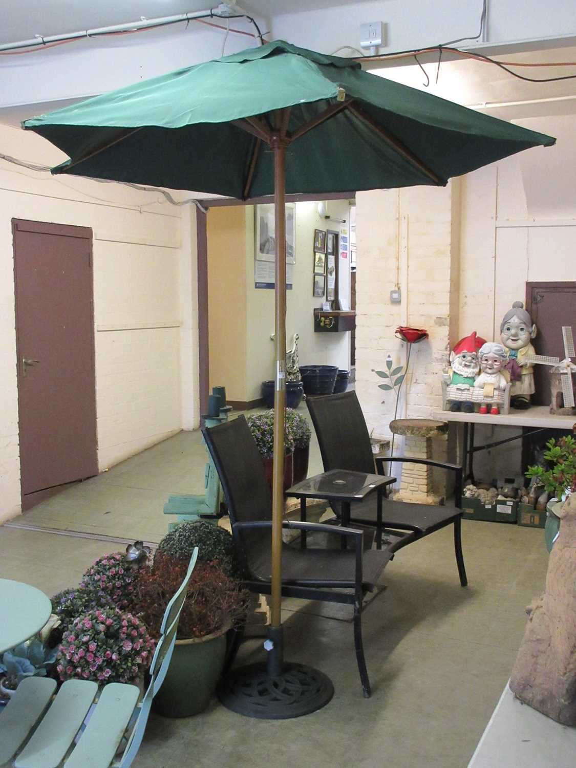 A garden parasol with base