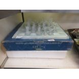 A boxed glass chess set