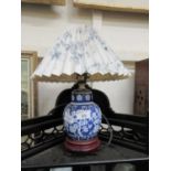 A Chinese ceramic columned table lamp