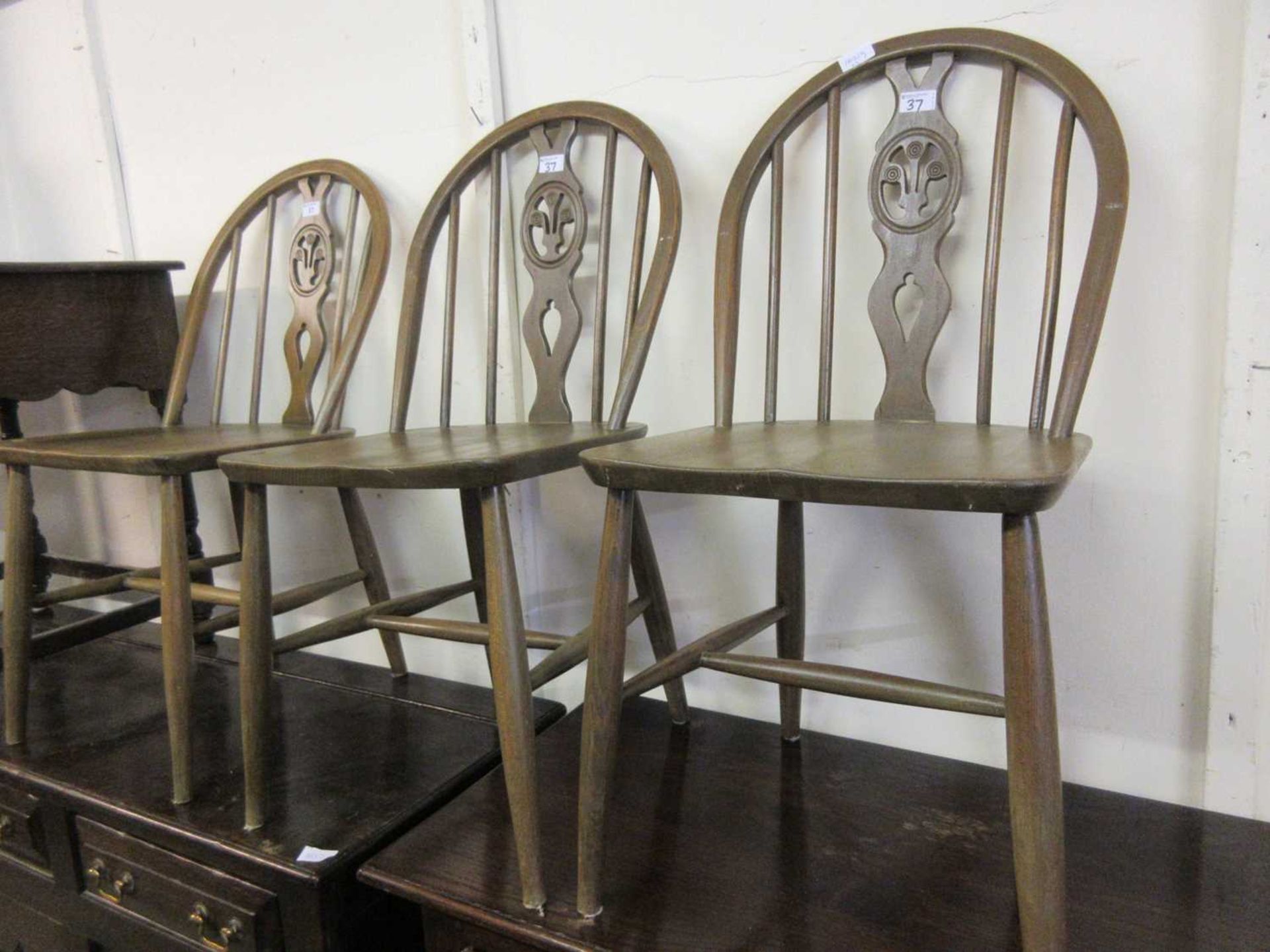 Three medium Ercol kitchen chairs