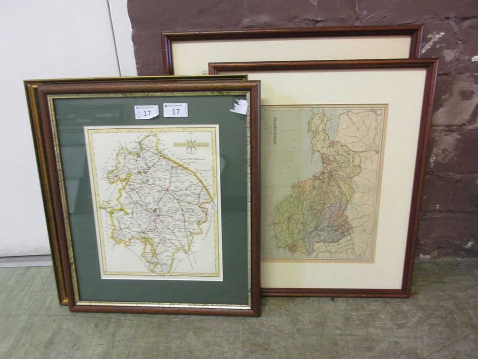 Four framed and glazed maps consisting of Warwickshire, Leicestershire, Glamorgan, and South Wales